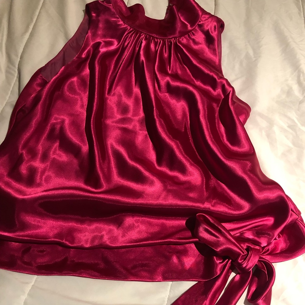 Hot pink silky sleeveless blouse with a hip bow